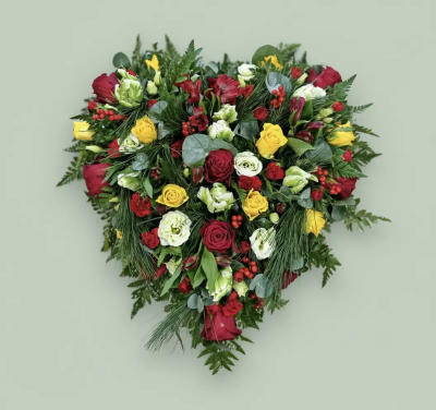 Heart - A heartfelt funeral tribute arranged in a classic heart shape, symbolising enduring love, treasured memories, and a lasting connection. Featuring rich, vibrant tones complemented by fresh seasonal textures and lush greenery, this design offers a meaningful expression of sympathy and remembrance. Thoughtfully created to honour a beloved family member, friend, or partner, it serves as a beautiful focal point at funeral services, memorial ceremonies, or celebrations of life.