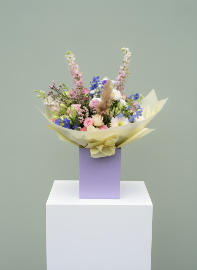 Pastel Charm - Expertly arranged with premium blooms and textured foliage, this natural-style bouquet is gift wrapped and presented in a water-filled aqua pack to keep the flowers fresh. Perfect for birthdays, celebrations, thank you gifts or simply to brighten someone's day. Flower varieties and colours may vary slightly with seasonal availability while maintaining the overall style and value.