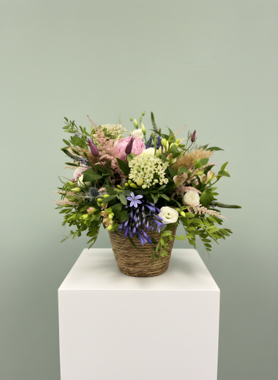 Wicker basket arrangement - Expertly arranged with premium blooms and textured foliage, this natural-stylePerfect for birthdays, celebrations, thank you gifts or simply to brighten someone's day.